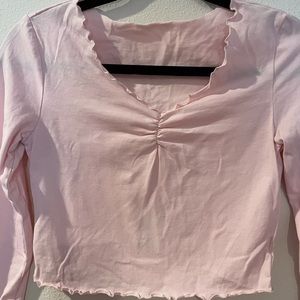 blush crop top with lettuce hem